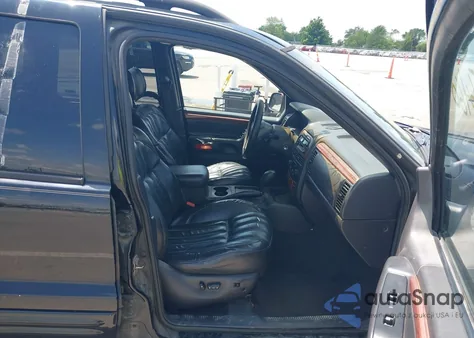 1999 Jeep Grand Cherokee Limited z USA, uszkodzony, nr VIN 1J4GW68N6XC614389